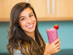 Woman Drinking Fresh Fruit Smoothie